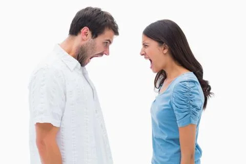 Angry couple shouting at each other Stock Photos