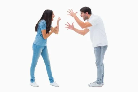Angry couple shouting at each other Stock Photos