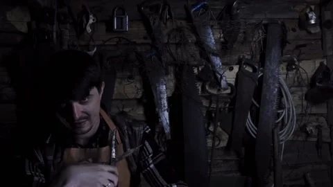 Angry crazy maniac with rusty scissors in an old house. copy space 動画素材 137133983