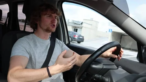 Angry driver shouts at another motorist during a road conflict Video stock 343720190