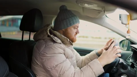 Angry driver in a traffic jam. He screams and Stock Footage 234691367