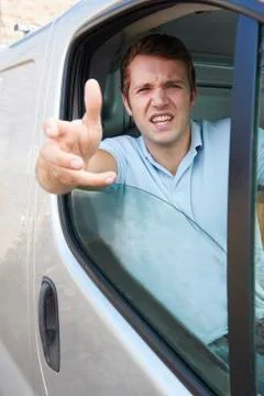 Angry Driver At Wheel Of Van Stock Photos