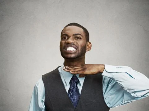 Angry executive man gesturing with hands to stop, cut it out Stock Photos