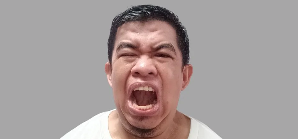 Angry expression of a man Stock Photos