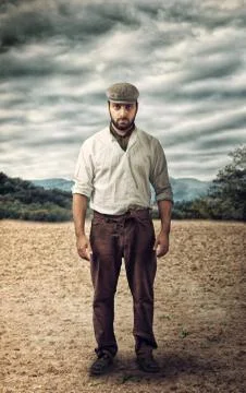 Angry farmer on a empty land Stock Photos