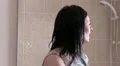 Angry female applying make up to her face HD Footage