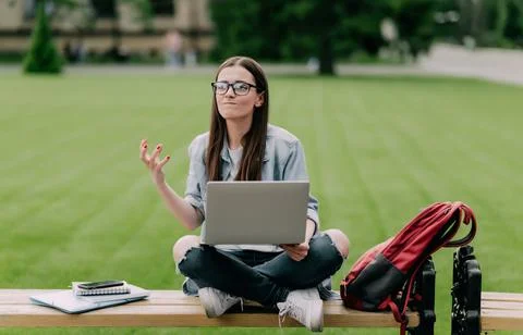 Angry female student having e learning remotely education problem with laptop Foto stock
