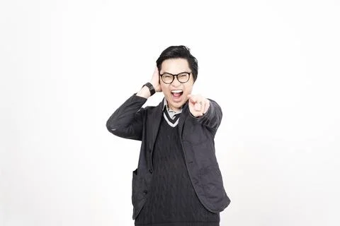 Angry Gesture Of Handsome Asian Man Isolated On White Background Stock Photos