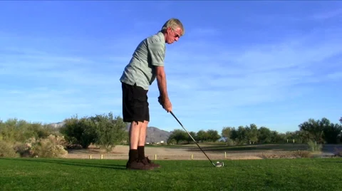 Angry golfer hits bad drive V1 - HD Stock Footage