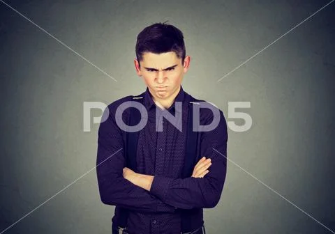 Angry grumpy man looking very displeased Stock Photos