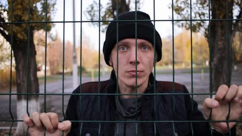 .angry guy looking heavy look. slow motion in the afternoon outdoors 動画素材 125088664