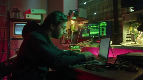 Angry hacker typing on keyboard at night, fail with breaking password, using Stock Footage 158386051