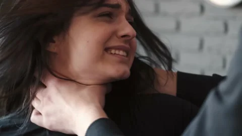Angry husband beating and choking scared wife at home Stock Footage 150241352