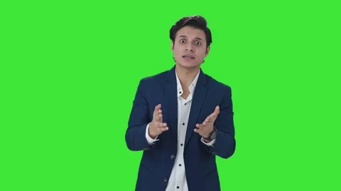 Angry Indian manager shouting on someone Green screen Stock Footage 253389675