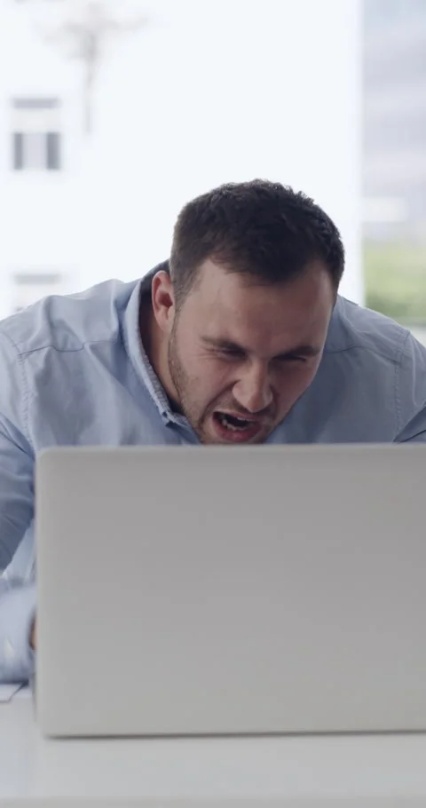 Angry, man and breakdown with laptop in office for network glitch, market crash Stock Footage 329761538