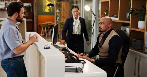 Angry, man and complaining to manager, hotel and disappointed with customer Stock Footage 310653966