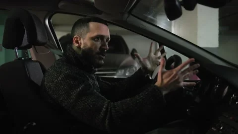 Angry man can't get out of the parking lot. Stressed driver getting mad and Stock Footage 232884637