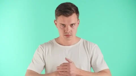 Angry man demonstrate negative emotions, indignation, ire, unfriendliness and Stock Footage 251382031