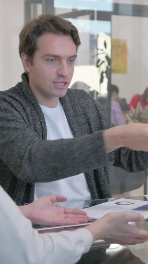 Angry Man Discussing Paperwork in Office, Argument, vertical video Stock Footage 324788980