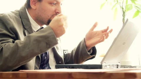 Angry man with laptop Stock Footage 923161