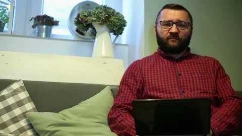 Angry man with laptop Stock Footage 70854768