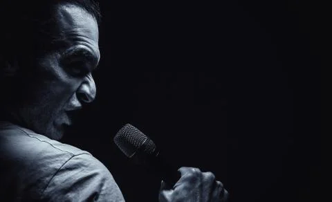 Angry Man With Microphone 스톡 사진