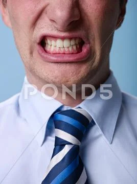 Angry man shouting at camera. close up Stock Photos