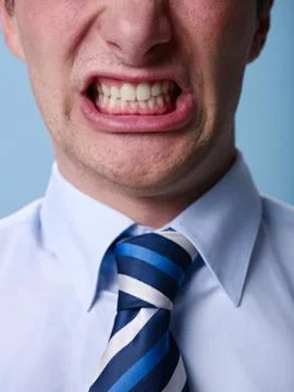 Angry man shouting at camera. close up Stock Photos