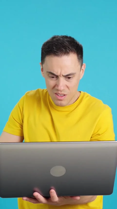 Angry man with some problems with the laptop Stock Footage 260108871