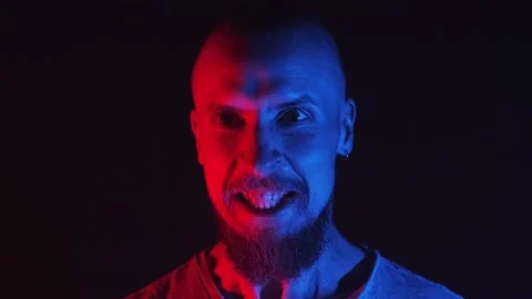 Angry man staring at his enemy, rival, victim or pray. face emotions Stock Footage 158587566