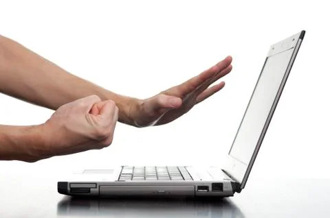 Angry man threatening computer Stock Photos