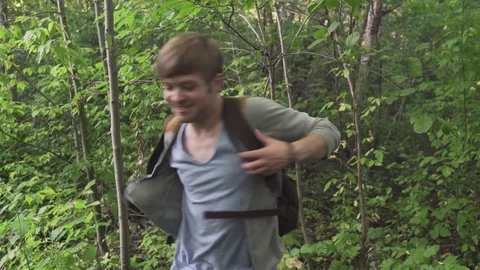 Angry Man Throwing his smartphone in the Forest Stock Footage 78928007
