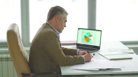 The angry man throwing papers from the table. slow motion Video stock 105198969