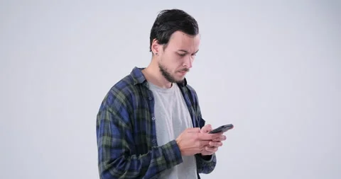 Angry Man type message using mobile phone Stock Footage 143943203