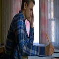 The angry man work with a paper. Real time capture 4k or 4k+ Resolution