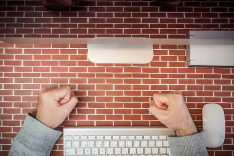 Angry man working in office Stock Photos