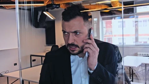 Angry manager talking on the phone Stock Footage 94715855