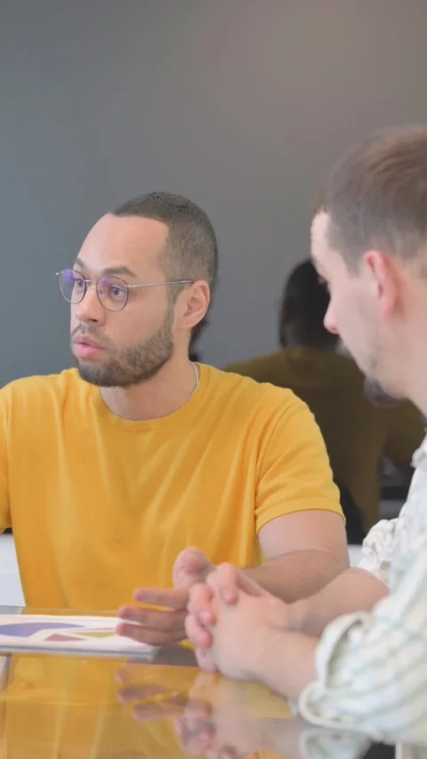 Angry Mixed Race Man Talking with Multi Ethnic Team, vertical video Video stock 325563483