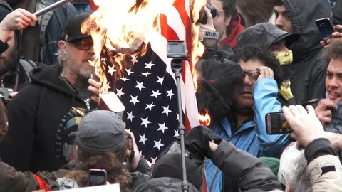 Angry Mob Burning The American Flag Stock Footage 72317064