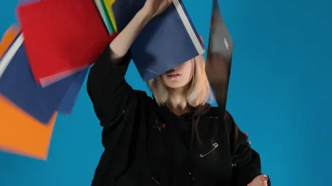 Angry model throws helmet and folders with documents Stock Footage 287983852