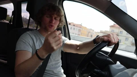 Angry nervous driver reacts after nearly getting into a car accident Stock Footage 343719859