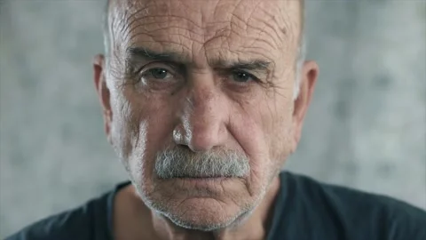 Angry old man portrait. Face of elderly senior guy, serious face looking to c Video stock 132972836