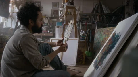 Angry Painter Throwing Palette and Brush at Canvas, Quitting Work in Studio Stock Footage 334686557