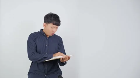 Angry Person Clenching Fist While Holding Document Видео 344830671