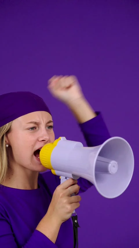 Angry protester shouting on megaphone Stock Footage 253164632