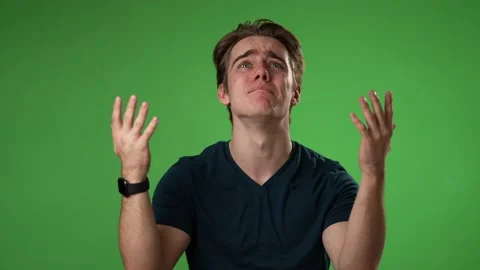 Angry, scared young man 20s put hands on head screaming crying ask why me Stock Footage 223525155
