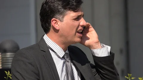 Angry Shocked Hispanic Business Man Using Phone Stock Footage