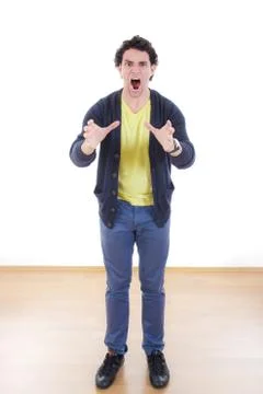 Angry stressed man writhes hands screaming with despair Stock Photos