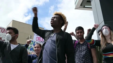 Angry students shouting at climate change protest Stock Footage 220374426
