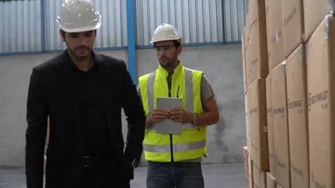 Angry supervisor Detect found dirtiness in the warehouse blamed worker and wa Stock Footage 146818996